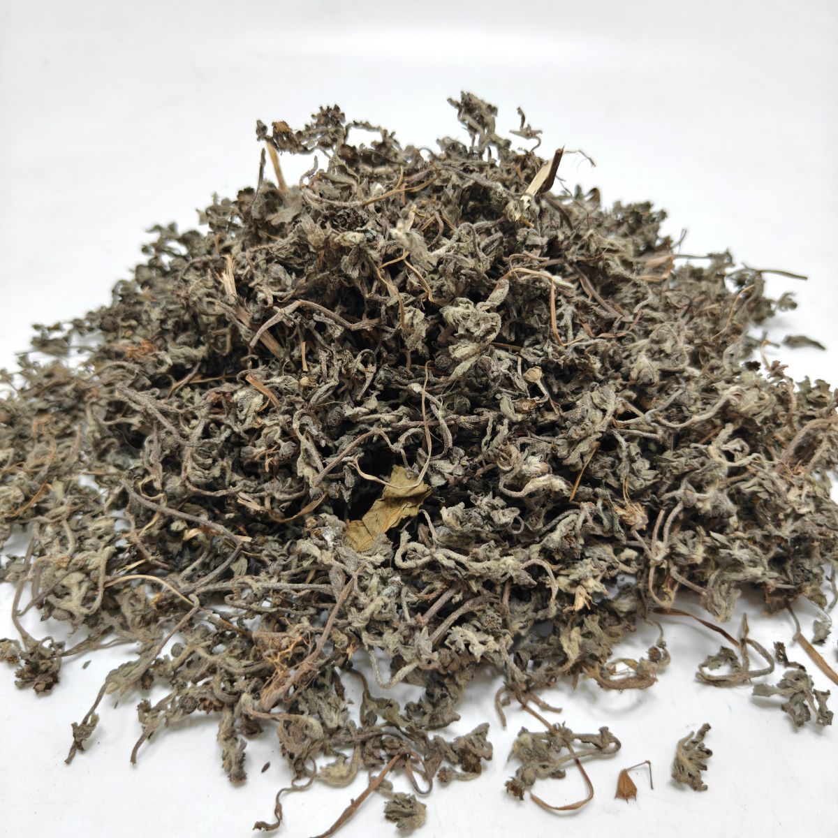 Close-up of natural sun-dried Bhringraj leaves used in Ayurvedic hair oil