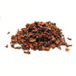 Dried Gudhal flower petals with fresh red Hibiscus rosa-sinensis bloom inset